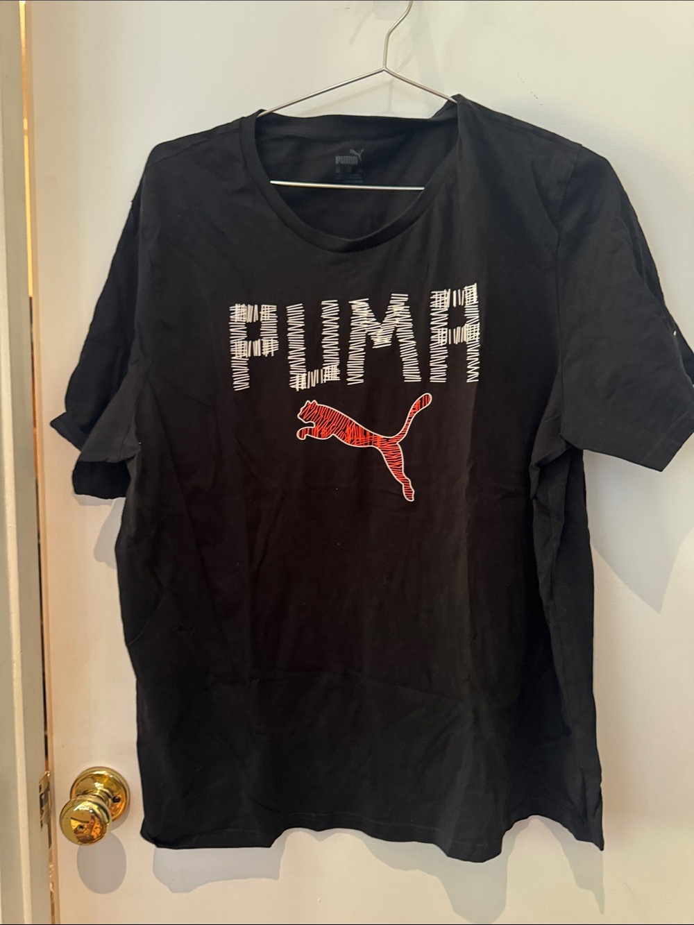 Puma Black Tee with White Text and Red Logo